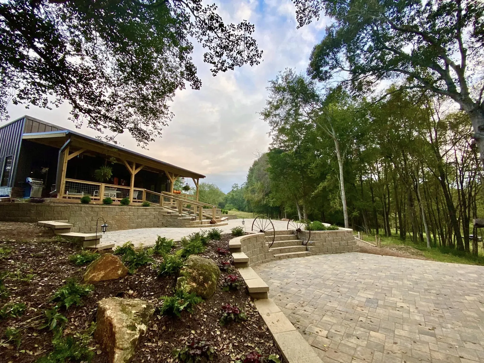 Paved arrival terrace and venue at The Shed at Papa's Creek wedding venue, Lavonia Northeast Georgia