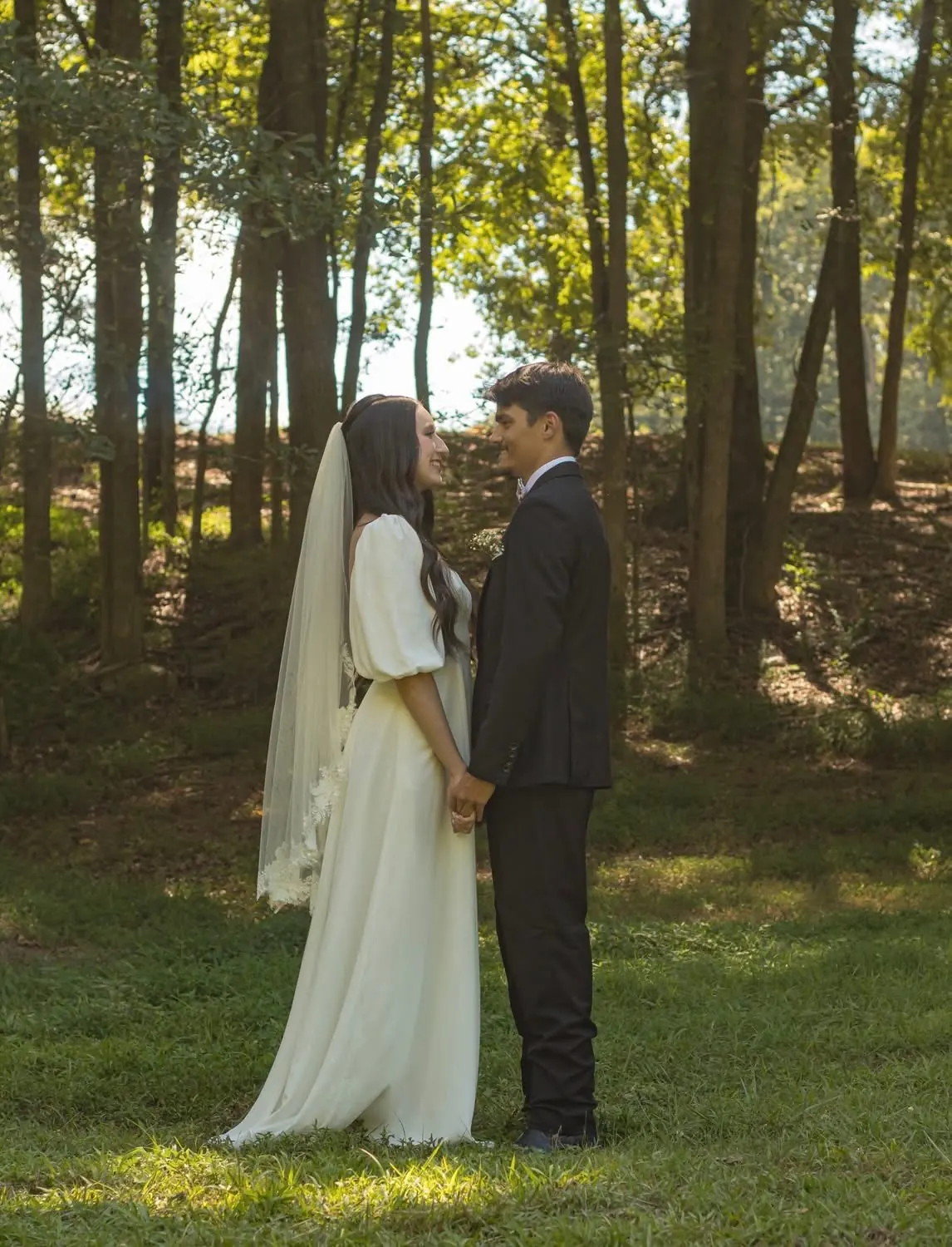 Bride and groom portrait in golden-lit woods at The Shed at Papa's Creek, Lavonia Georgia