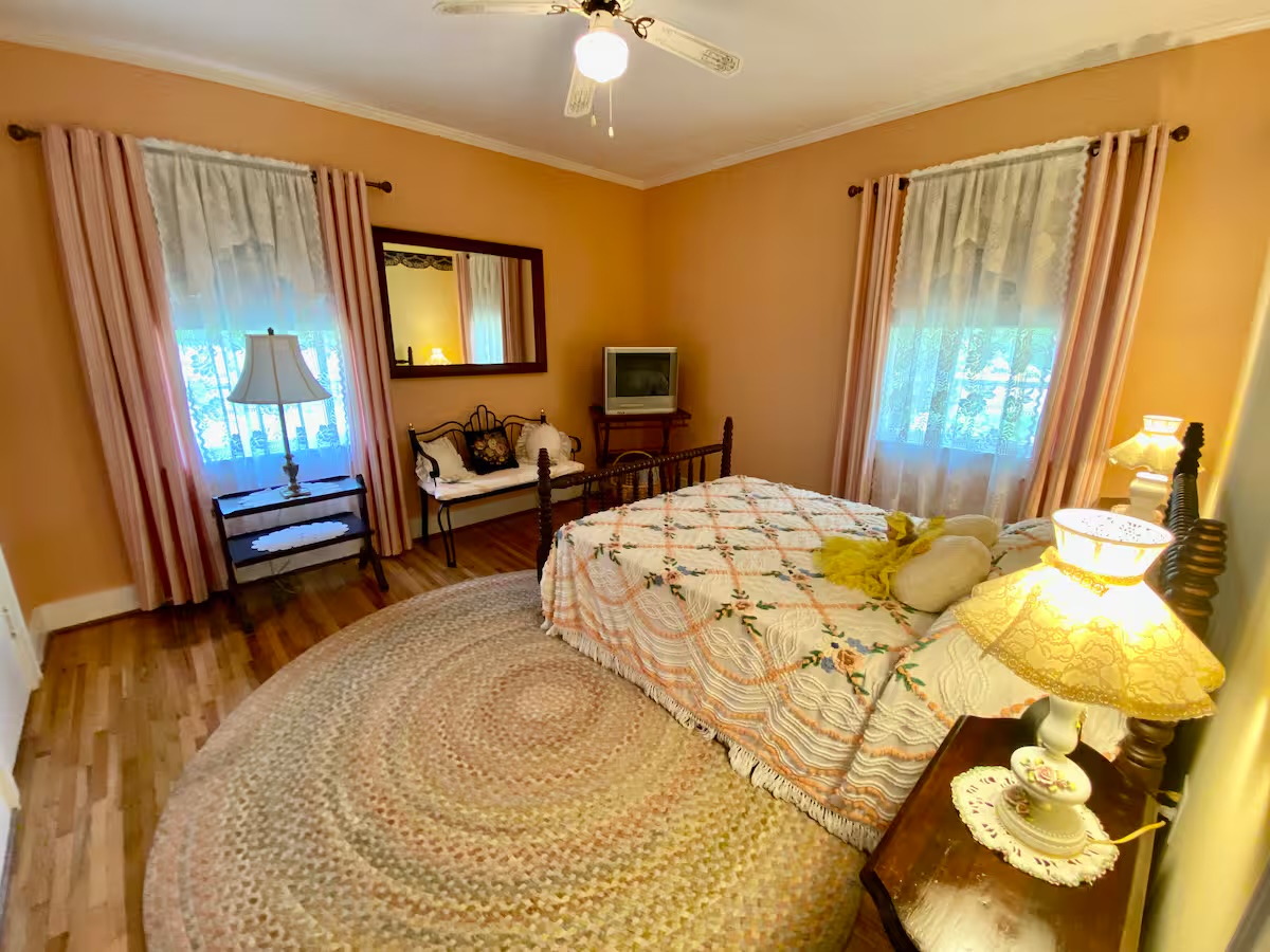 Warm guest bedroom in Harrison House near The Shed
