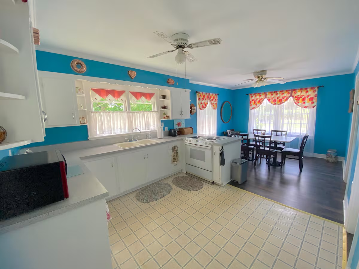 Bright kitchen and dining area inside Harrison House